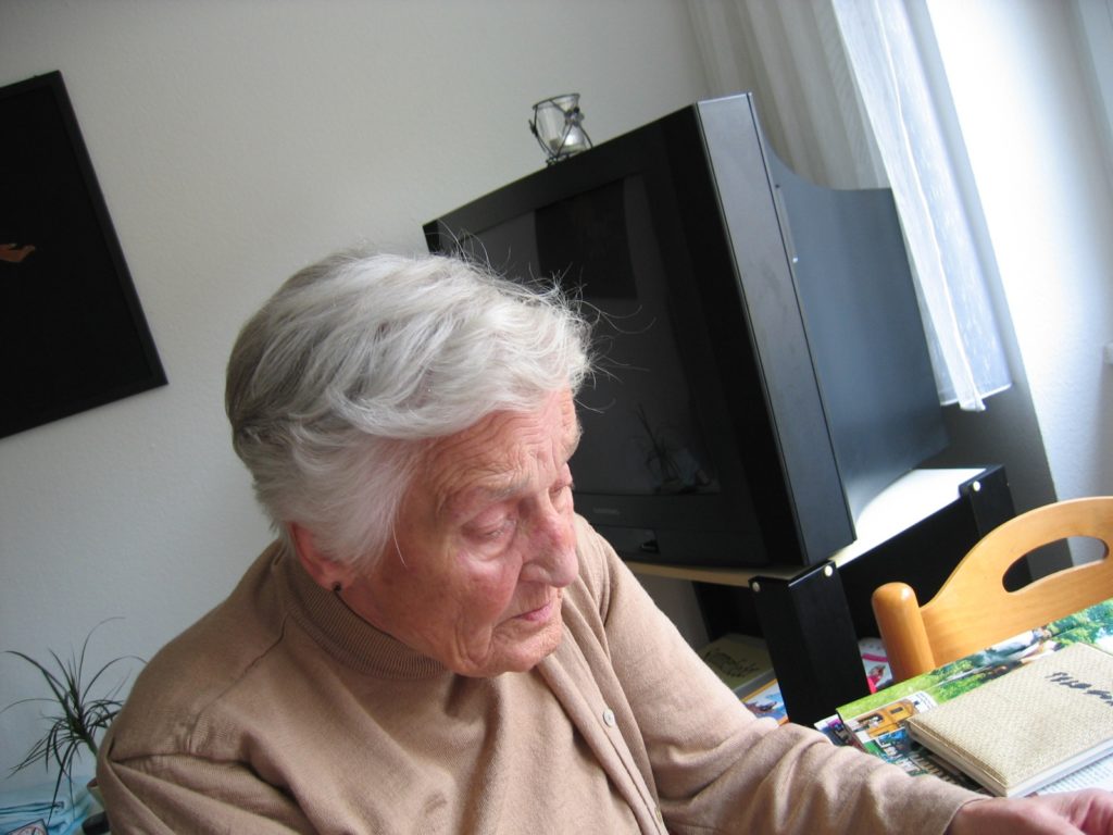 Senior Woman Considering Downsizing Tampa FL Movers